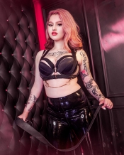 Mistress Willow is Holding a Whip in the Dungeon